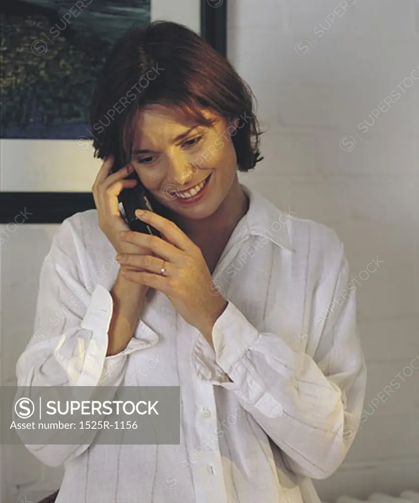 woman using telephone