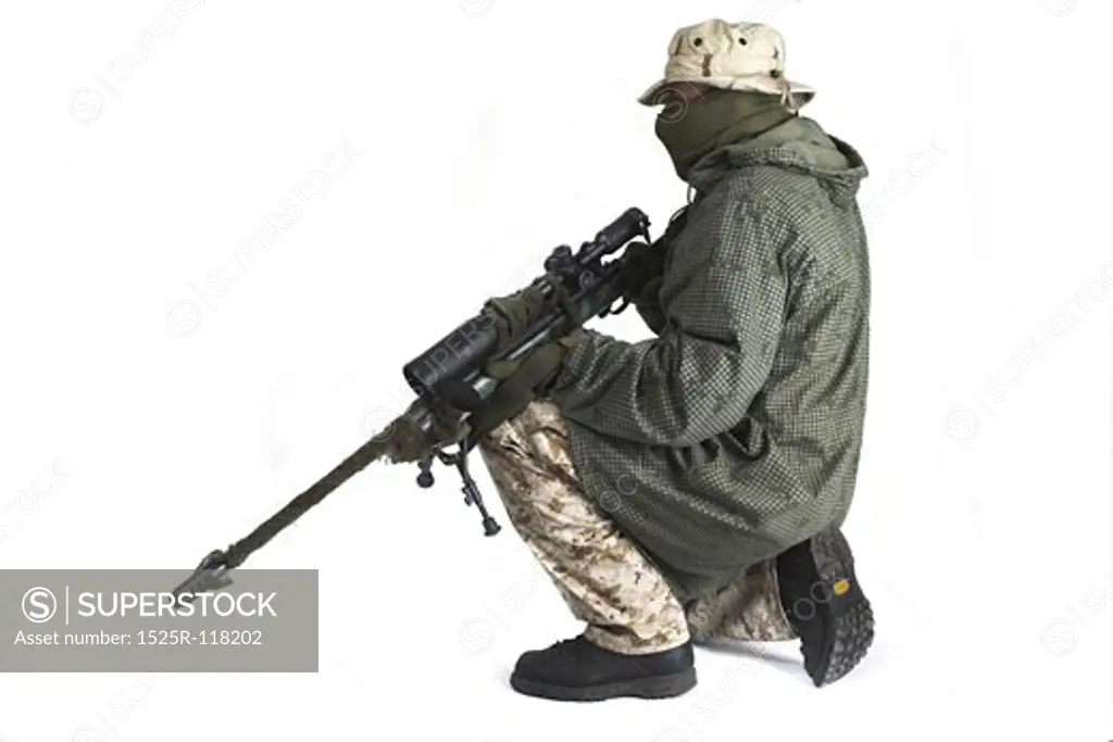 Sniper is wearing a desert uniform and an anti-IR cloak.