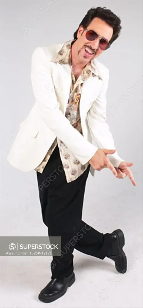 Man dancing in seventies-style clothes 2