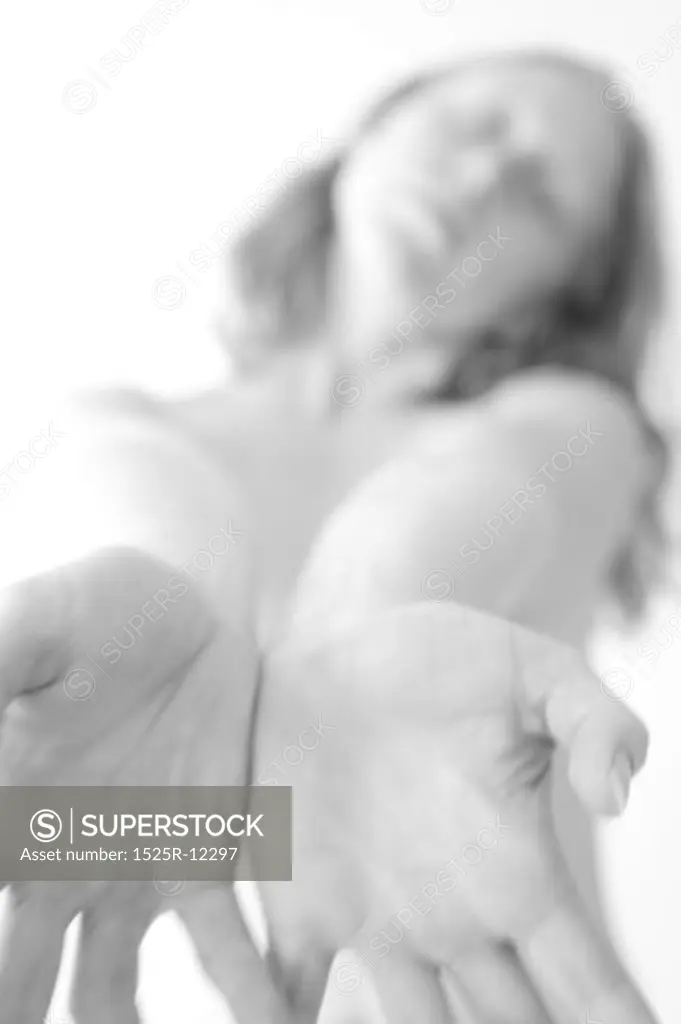 Female Nude Holding Out Hands