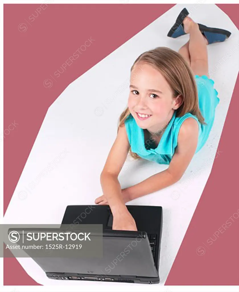 Little girl using laptop 