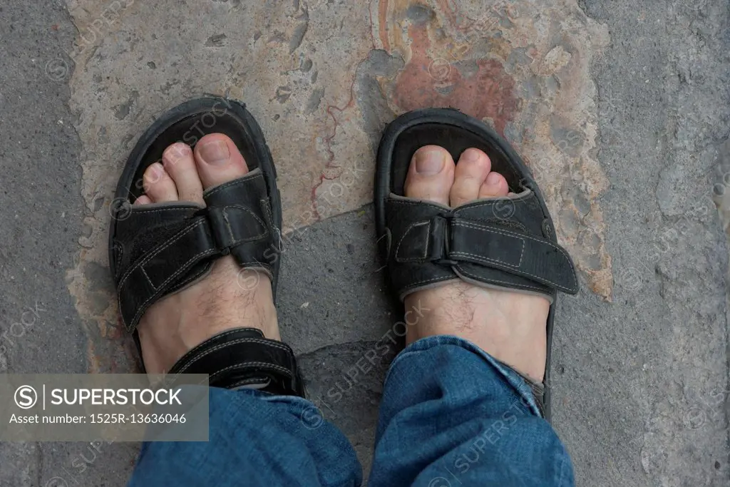 Top view of sandals on a man&rsquo;s feet, San Miguel de Allende, Guanajuato, Mexico