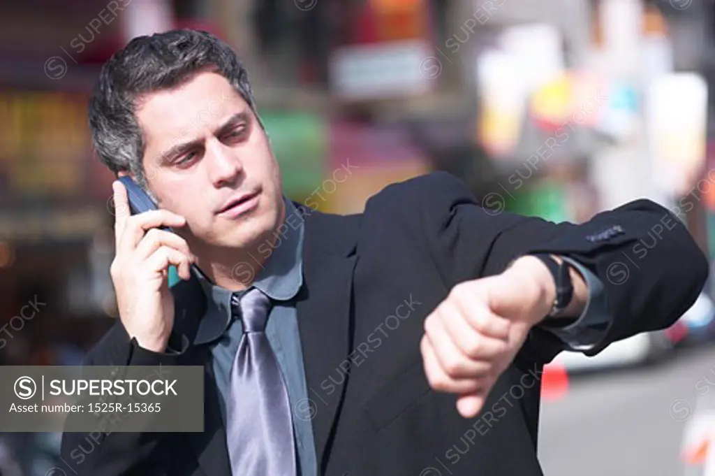 Business man and cellphone 