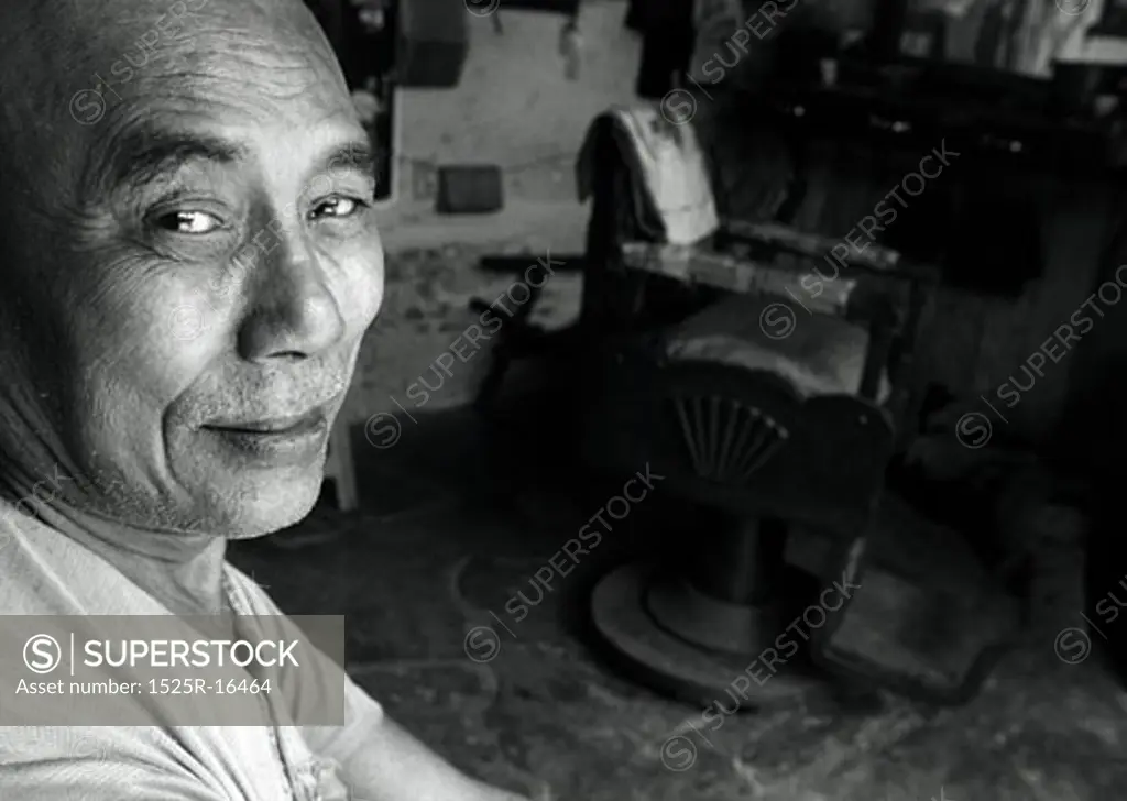 elderly man at a barbershop