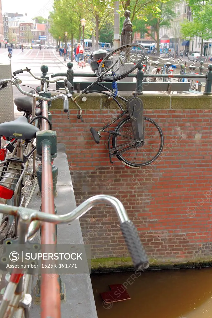 Bicycles parked on railing