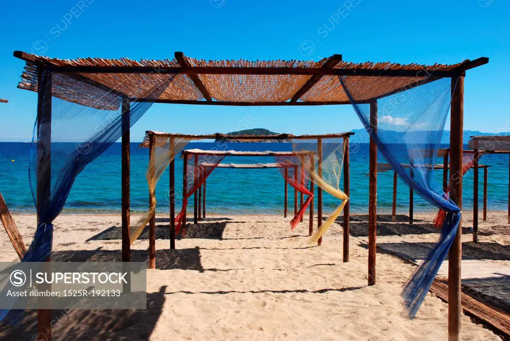 Summery shaded resting areas on beach, Greece