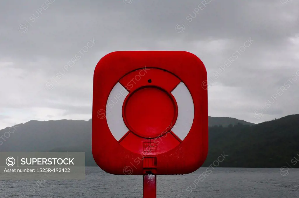Red boat mooring marker, Loch Ness, Scotland UK.
