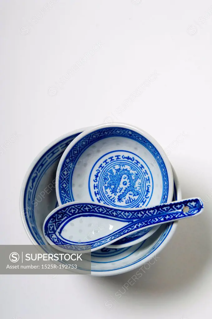 Blue asian soup bowls and spoon.