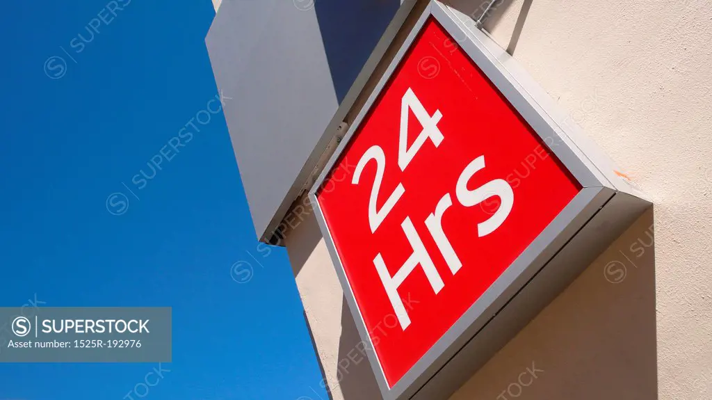 Open 24 hours retail shopping sign.