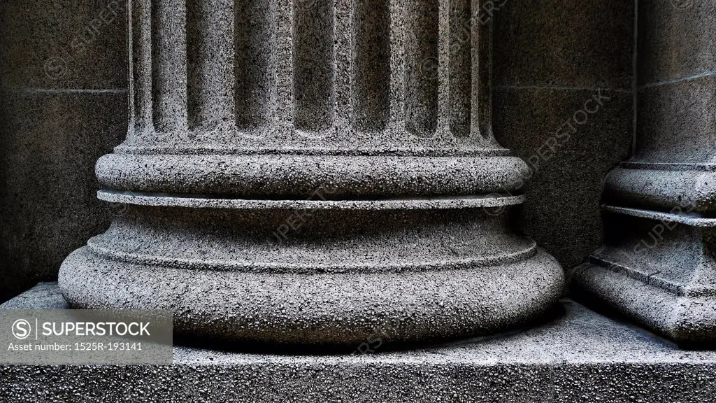 Close-up of a strong supportive pillar base.