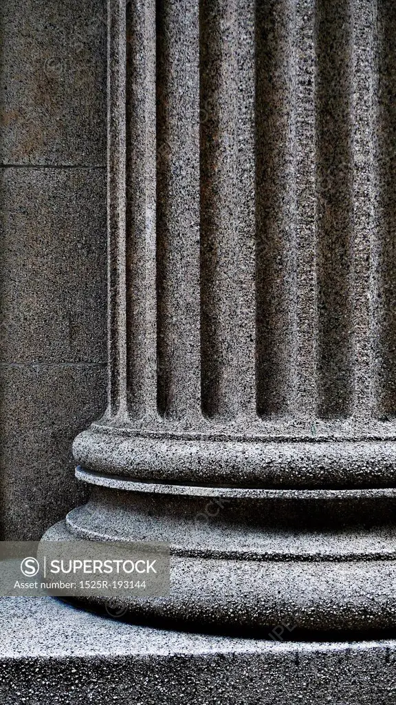 Close-up of a strong supportive pillar base.