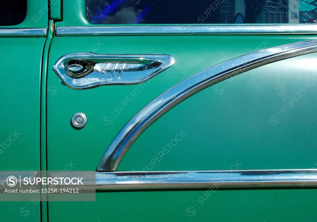 Old green Chevy door in Cuba.