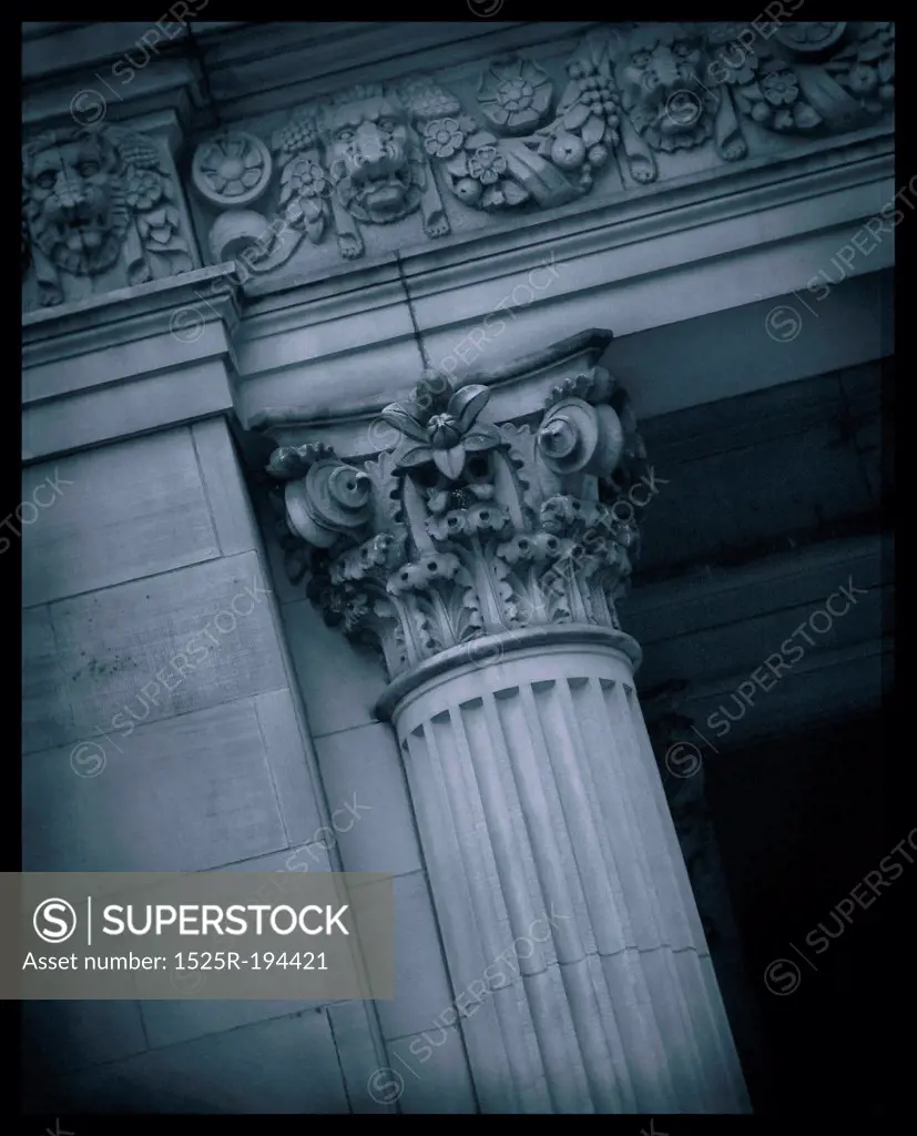 Architectural detail of pillar and cornice.