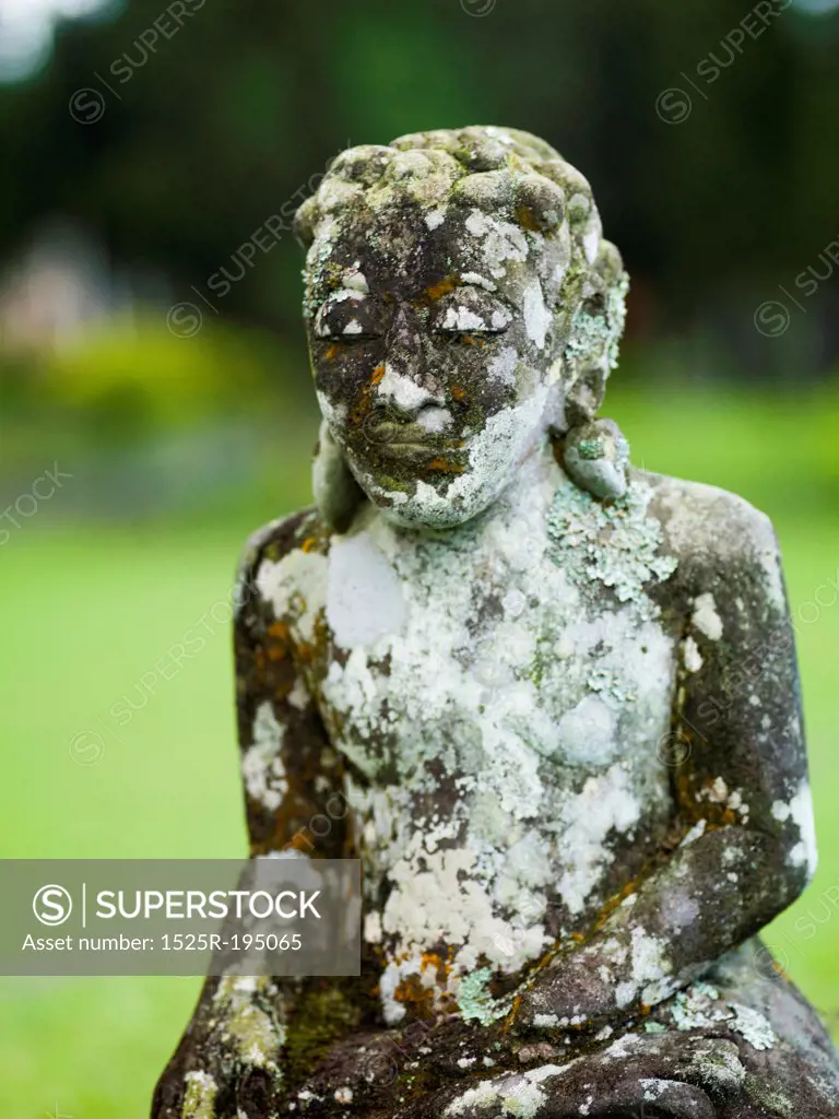 Weathered statue in Bali