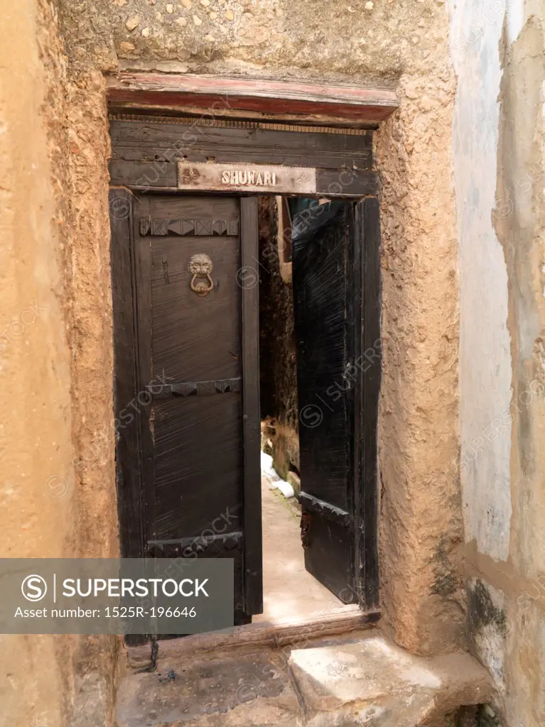 Open wooden door in Lamu Town, Africa