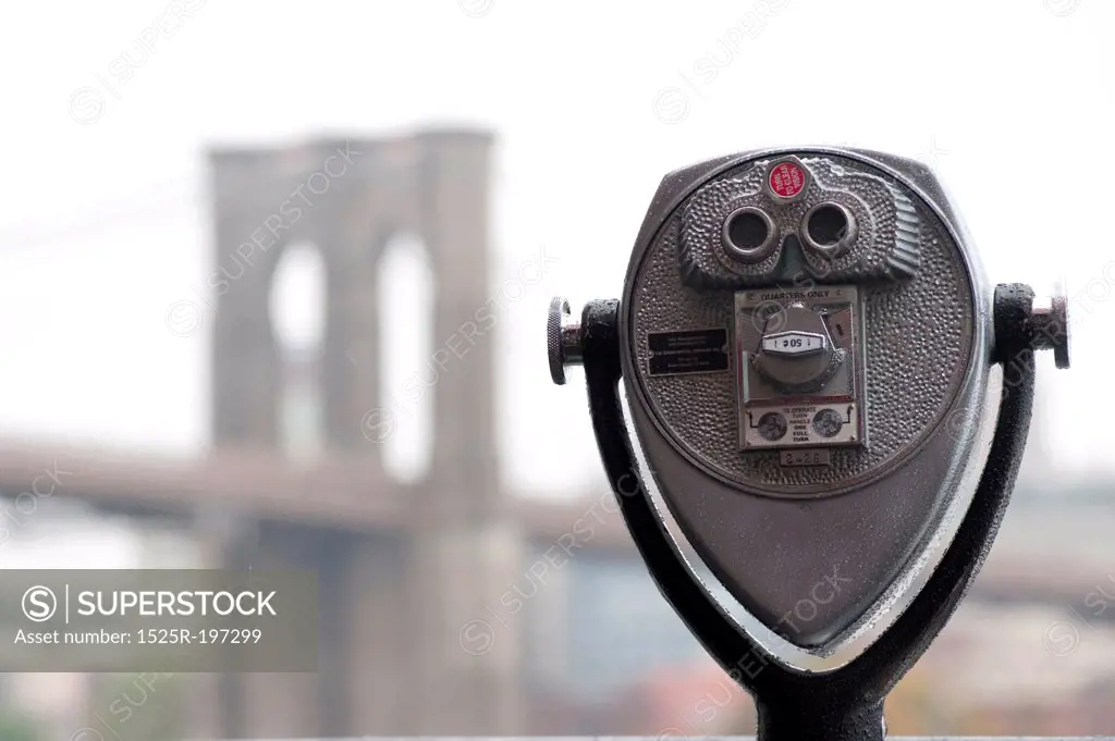 Binoculars on riverbank in Manhattan, New York City, U.S.A.