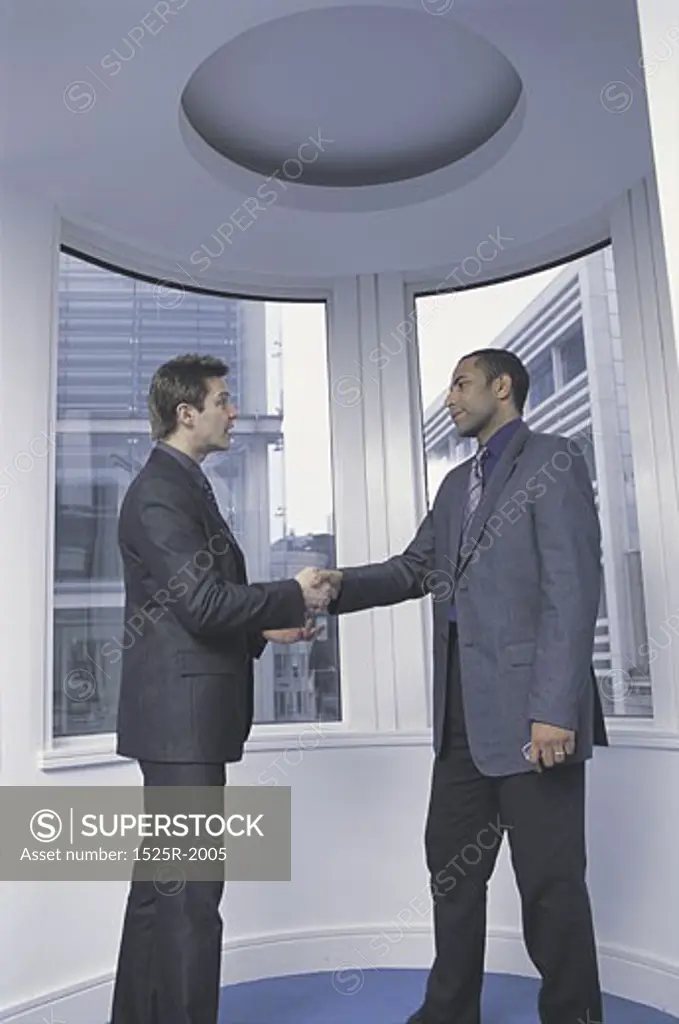 men meeting in office and making handshake