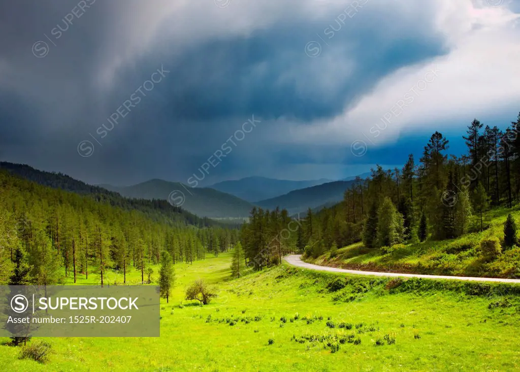 Mountain landscape with storm clouds