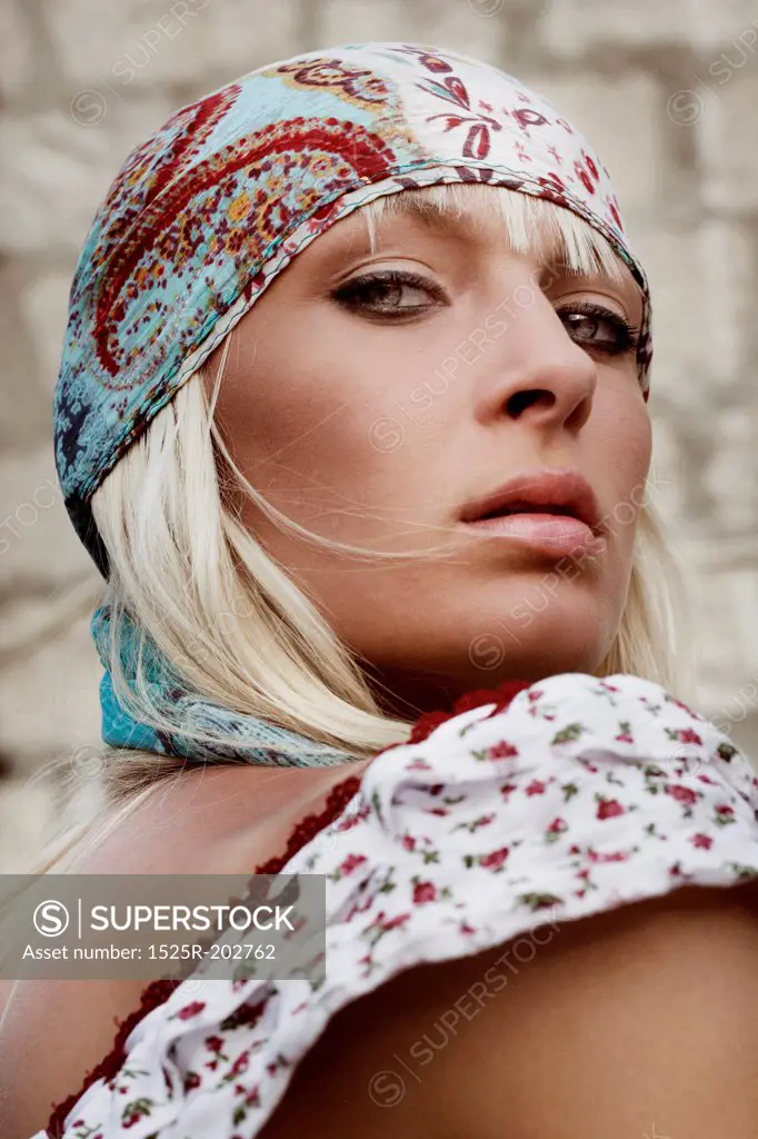 Portrait of a young attractive blond beauty, hippie look