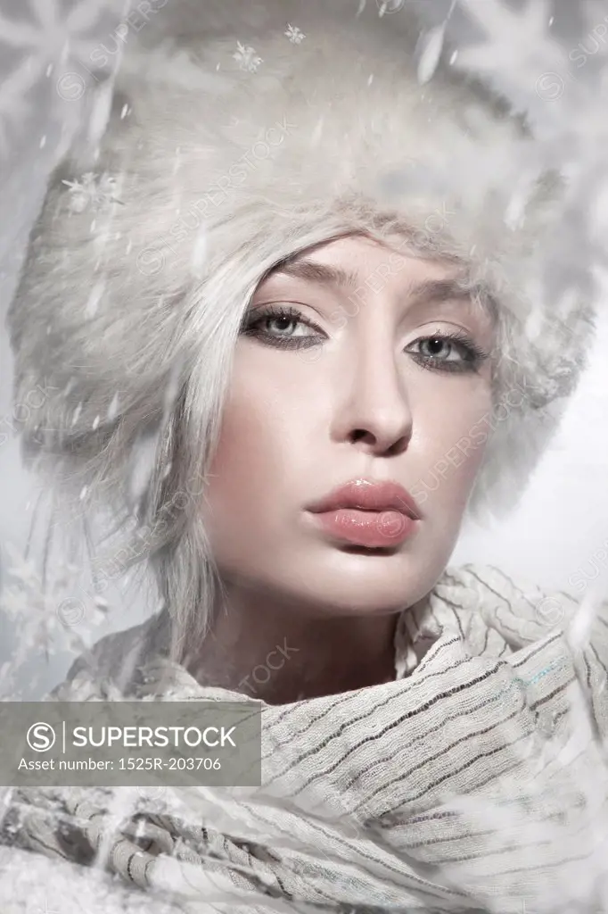 Winter style portrait of a beautiful young lady