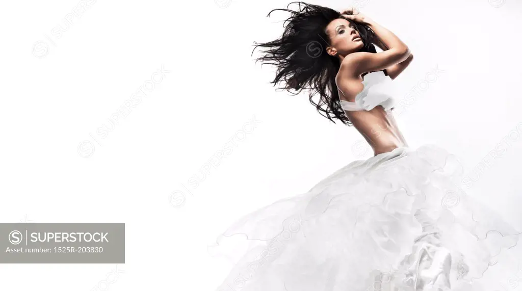 Sexy woman wearing white dress