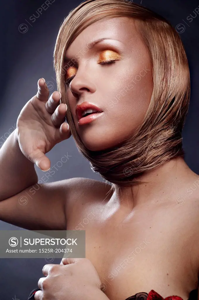 Portrait of beautiful blond woman with stylish make-up