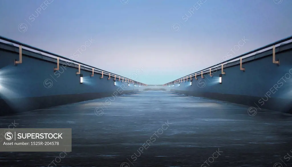 Road through the bridge with blue sky background