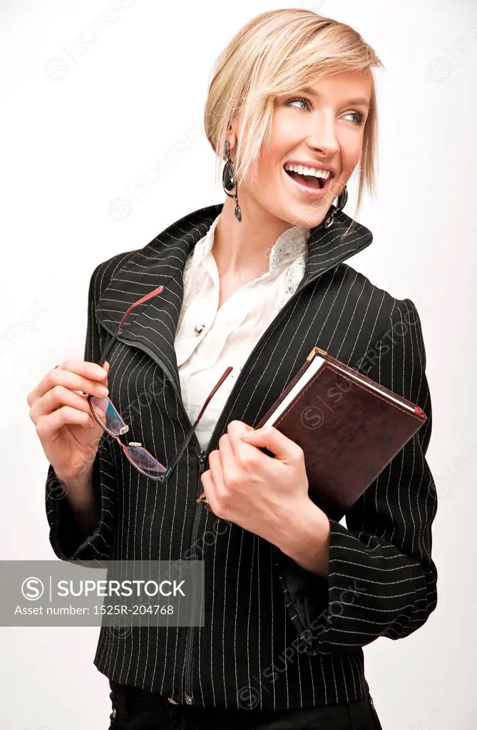 Young blonde businesswoman smiling