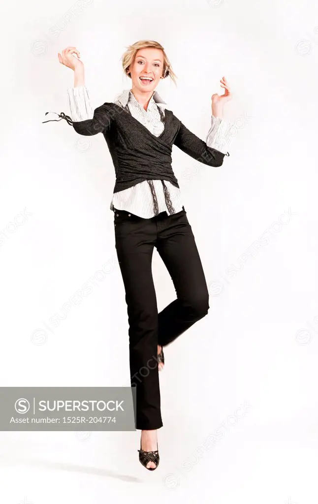 Jumping happy businesswoman