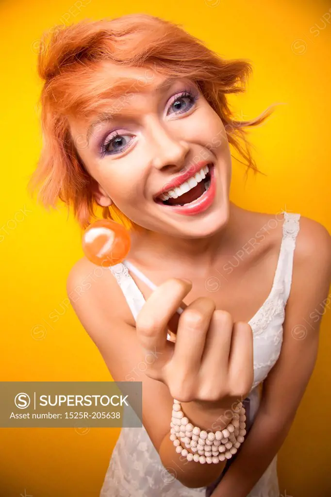 Woman posing with lollypop