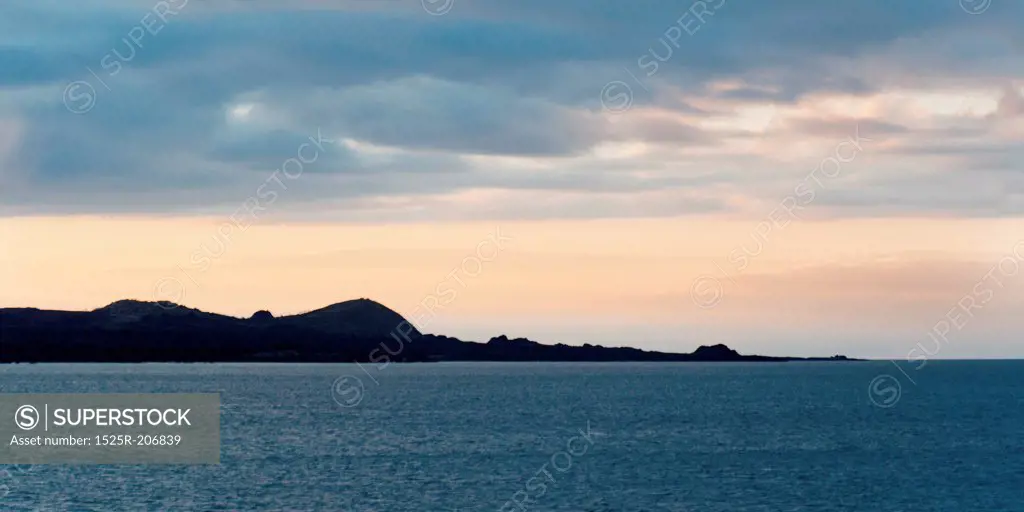 Sunset over the Pacific Ocean, Santiago Island, Galapagos Islands, Ecuador