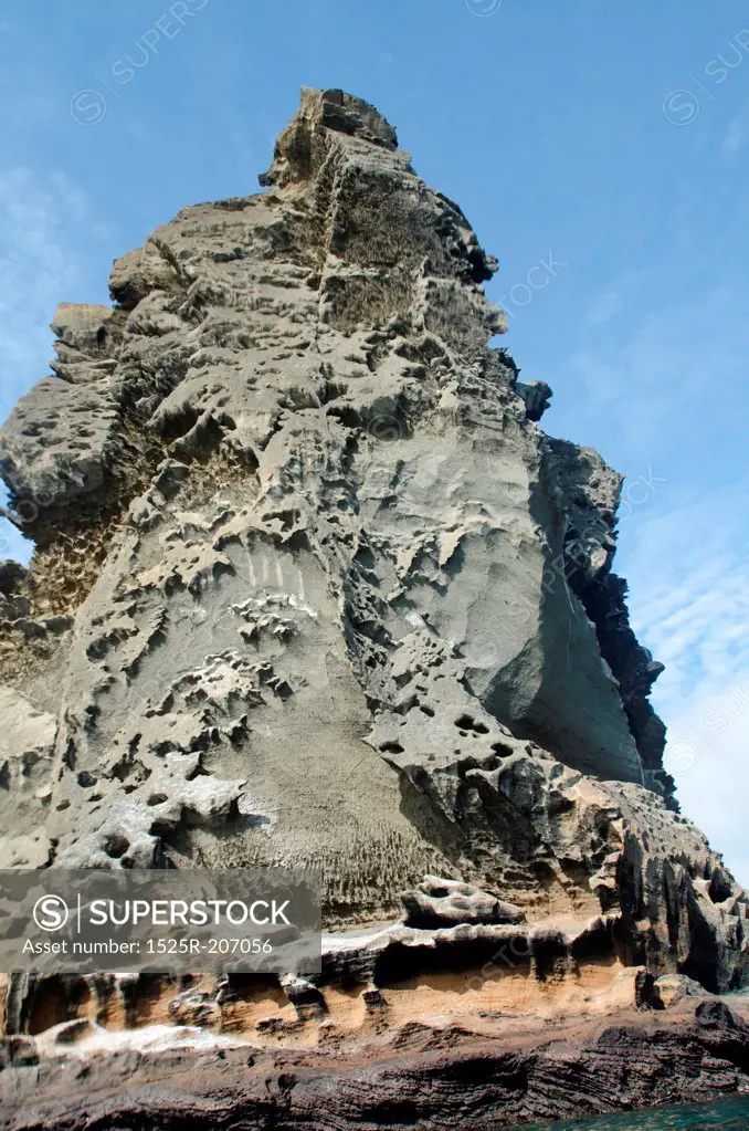 Low angle view of a pinnacle rock, Bartolome Island, Galapagos Islands, Ecuador