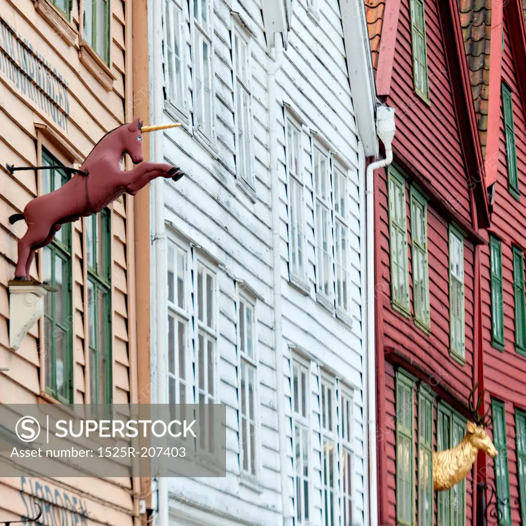 Low angle view of a unicorn statue on a building, Bryggen, Bergen, Norway