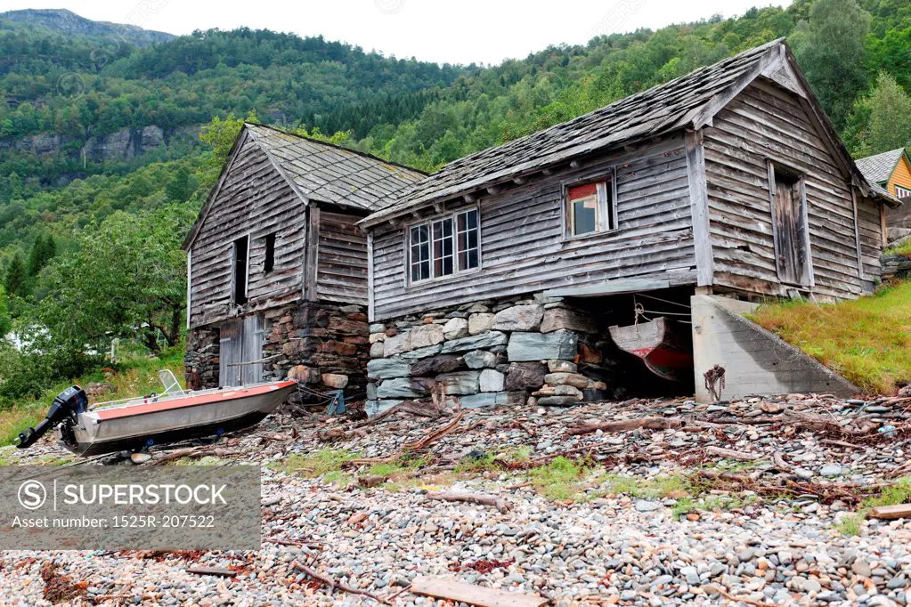 Abandoned wooden houses at the coast, Hardanger, Hardangerfjord, Hardangervidda, Hardanger, Norway