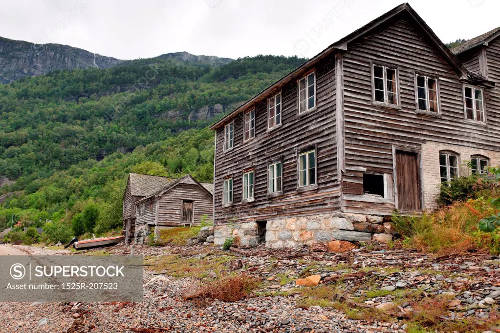 Abandoned wooden houses at the coast, Hardanger, Hardangerfjord, Hardangervidda, Hardanger, Norway