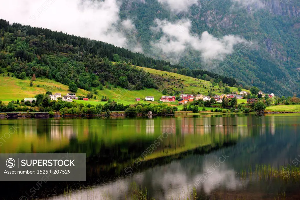 Village at waterfront, Granvinsvatnet, Granvin, Hordaland County, Norway
