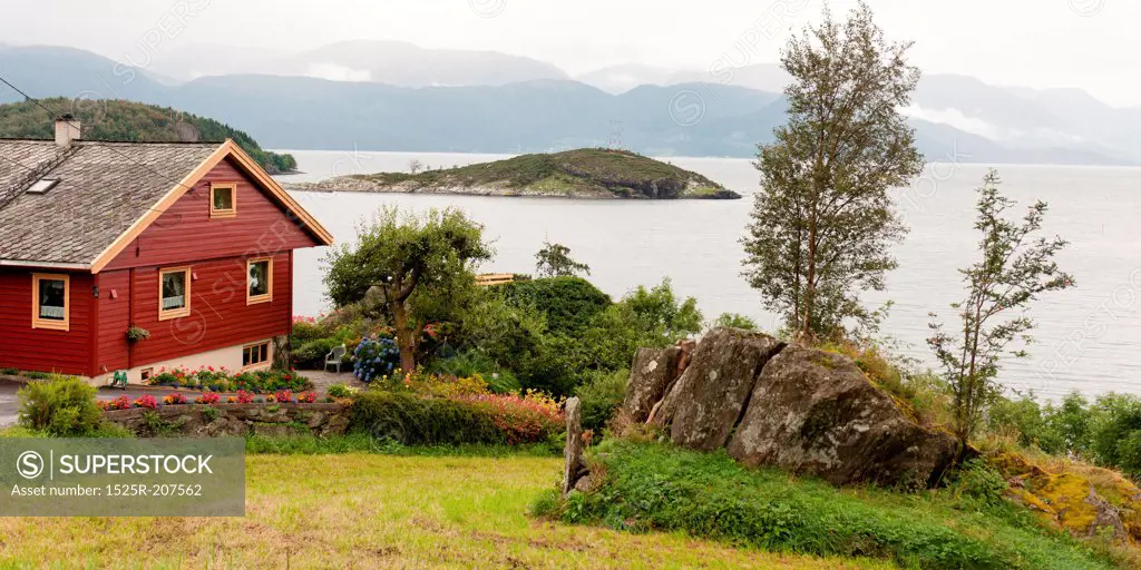 House at waterfront, Hardanger, Hardangerfjord, Hardangervidda, Hardanger, Norway