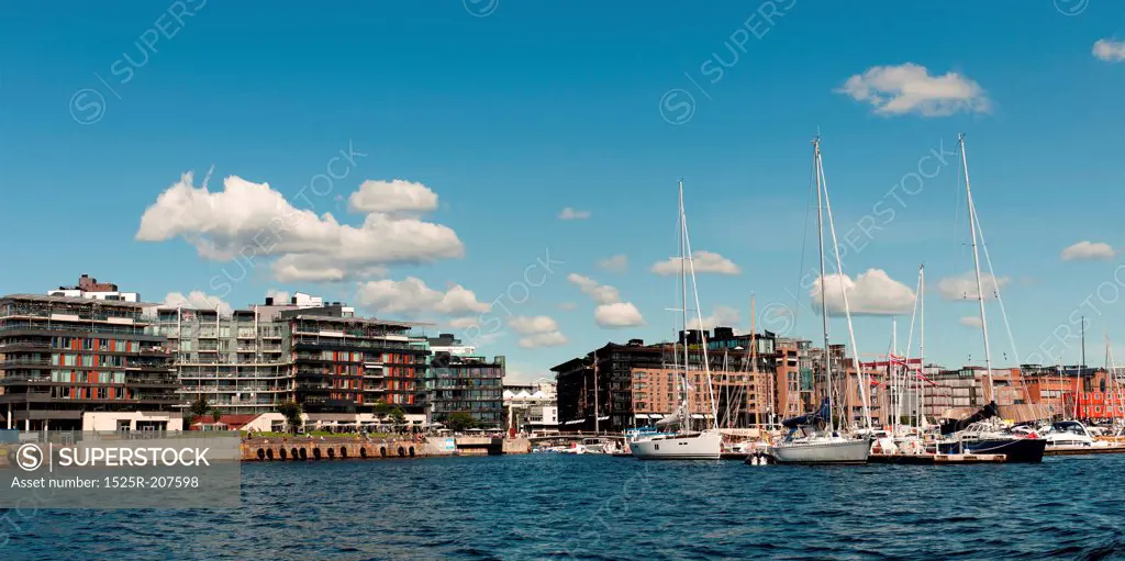 Boats with buildings at Oslo Harbor, Oslofjord, Oslo, Norway