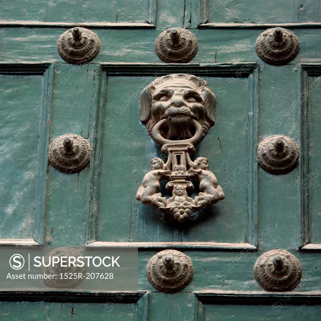 Door knob and rivets on a door, Cuzco, Peru
