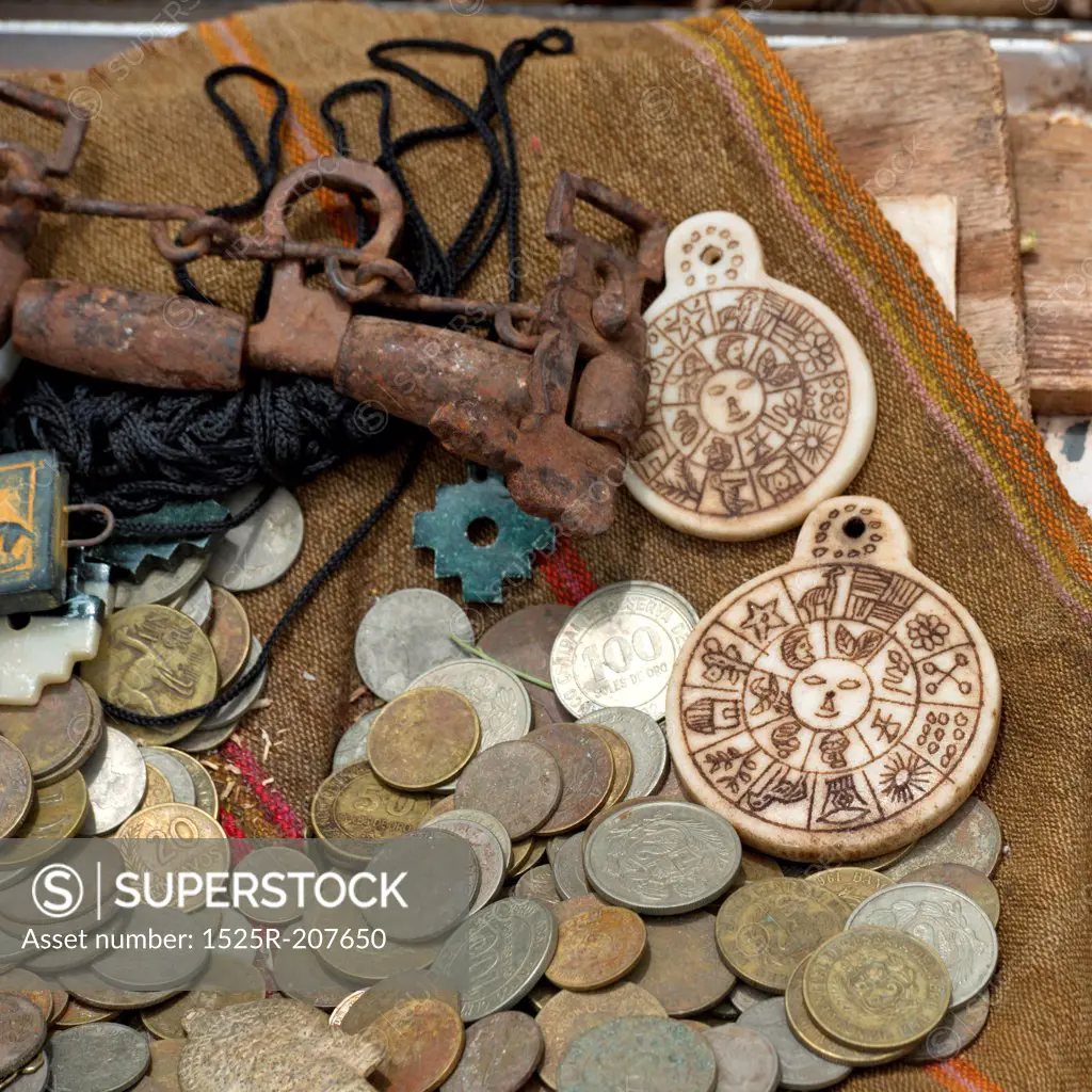 Old coins at a store, Chinchero, Sacred Valley, Cusco Region, Peru
