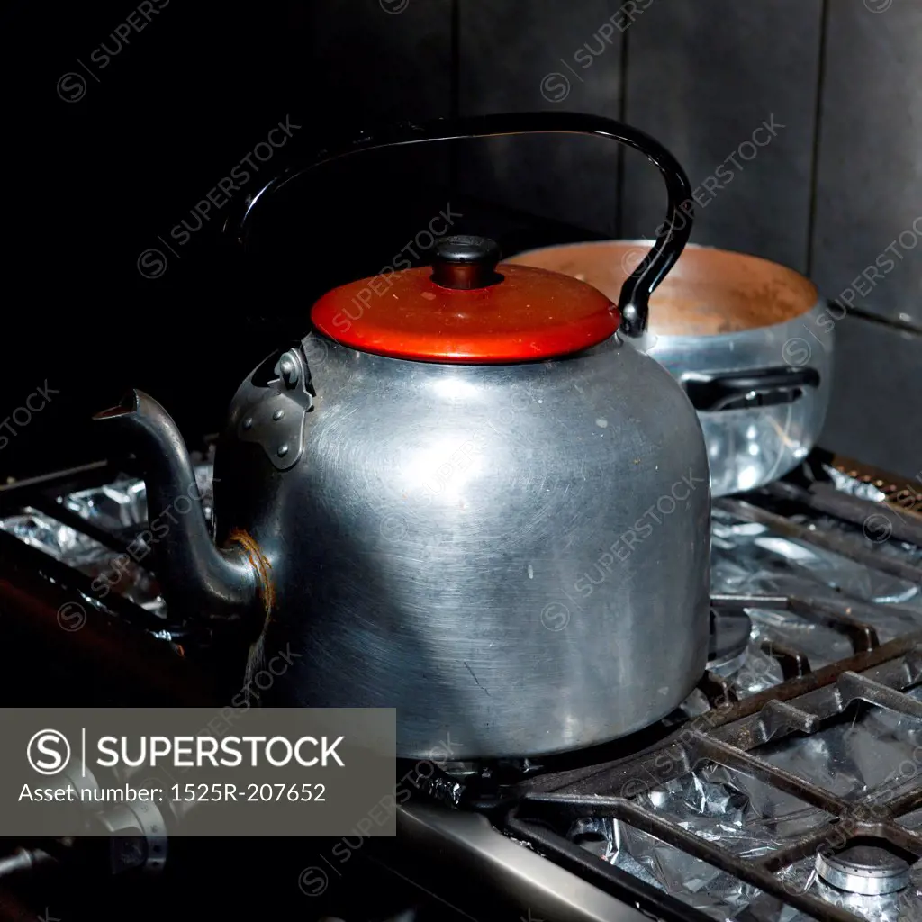 Kettle on a gas stove burner in a kitchen of a guesthouse, Willka Tika, Sacred Valley, Cusco Region, Peru