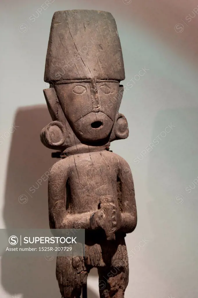 Pre-Columbian Wooden statue in Museo de Arte Precolombino, Cuzco, Peru