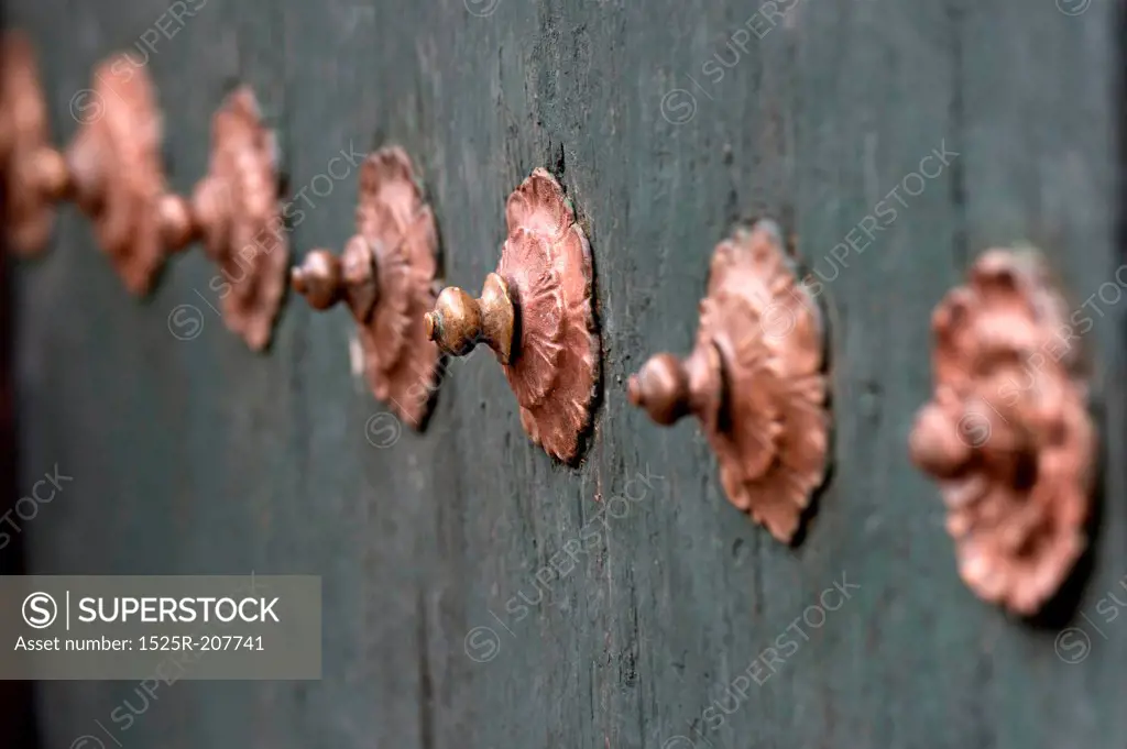 Close-up of rivets on a door in Cuzco, Peru