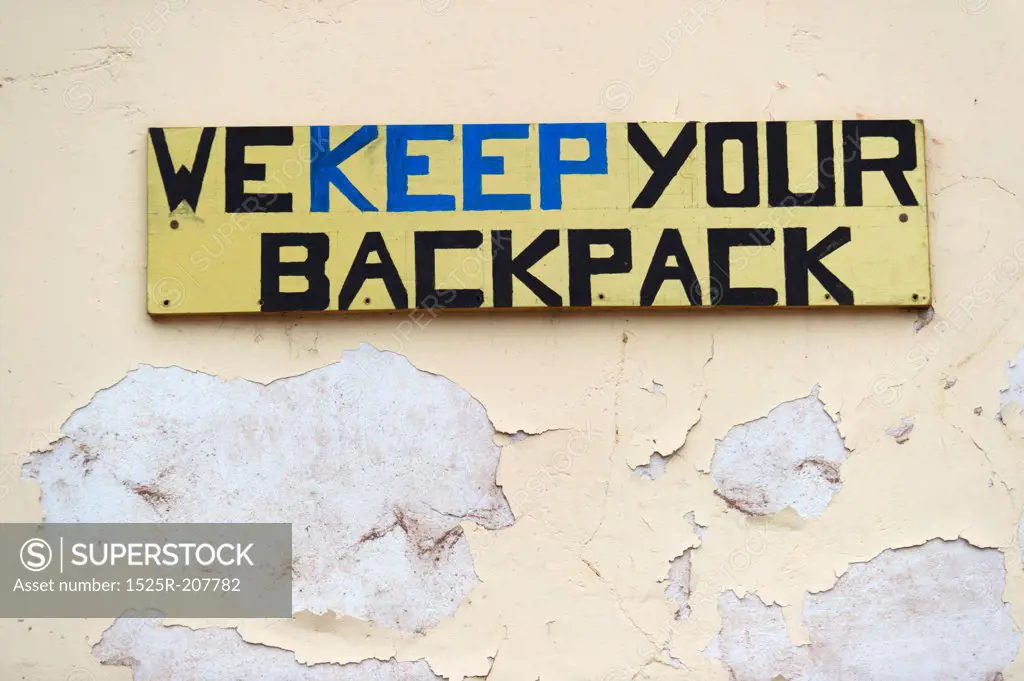WE KEEP YOUR BACKPACK signboard at a store, Pisac, Sacred Valley, Cusco Region, Peru