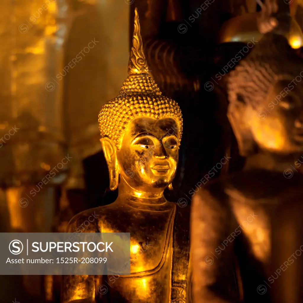 Golden statues of Buddha at Wat Phra Singh, Chiang Mai, Thailand