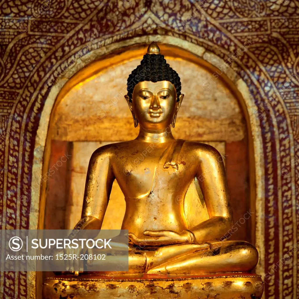 Golden statue of Buddha at Wat Phra Singh, Chiang Mai, Thailand