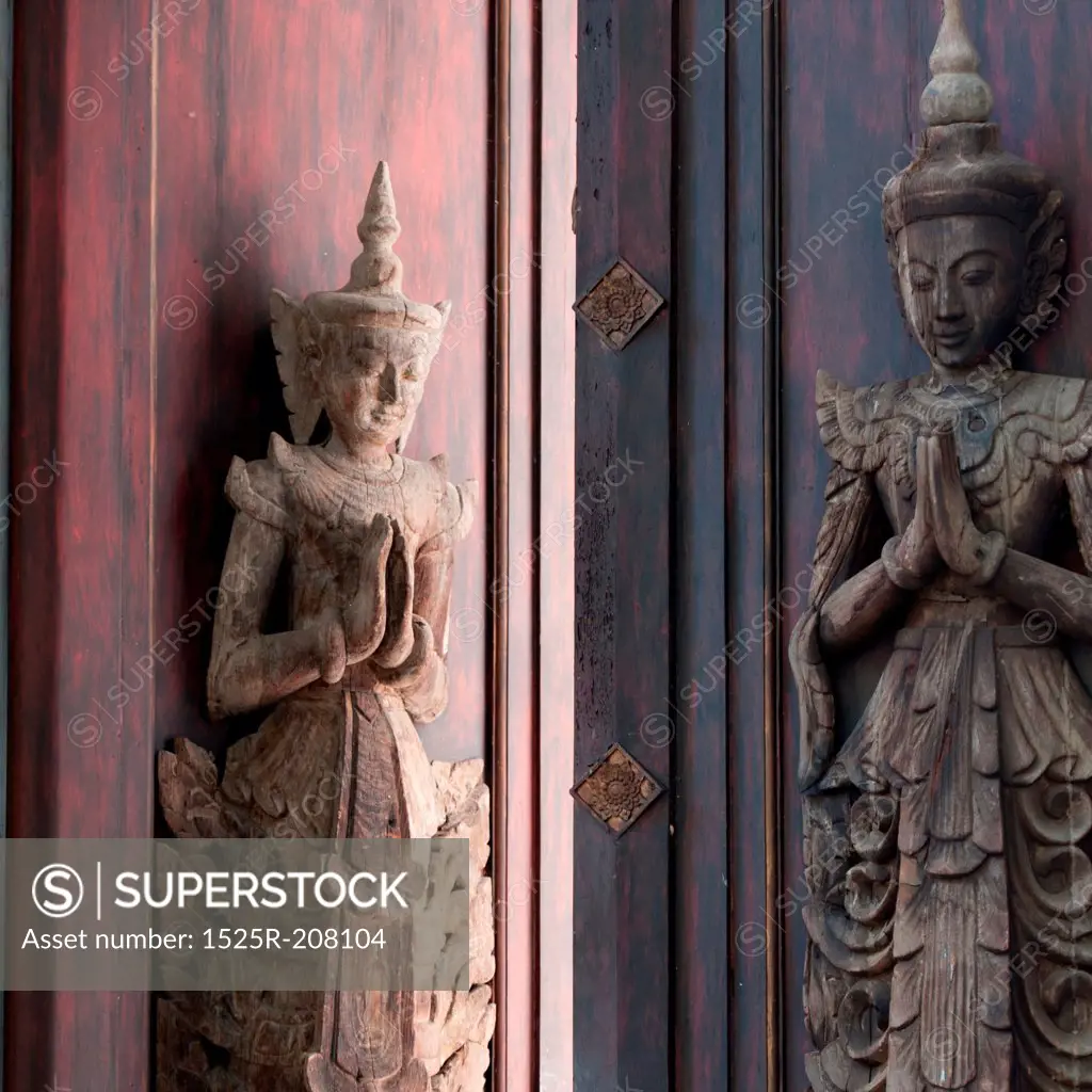 Apsara statues at the entrance of Mandarin Oriental Dhara Dhevi, Chiang Mai, Thailand