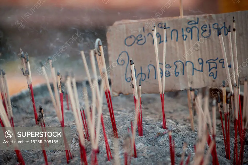 Incense sticks at Wat Phrathat Doi Suthep temple, Chiang Mai, Thailand
