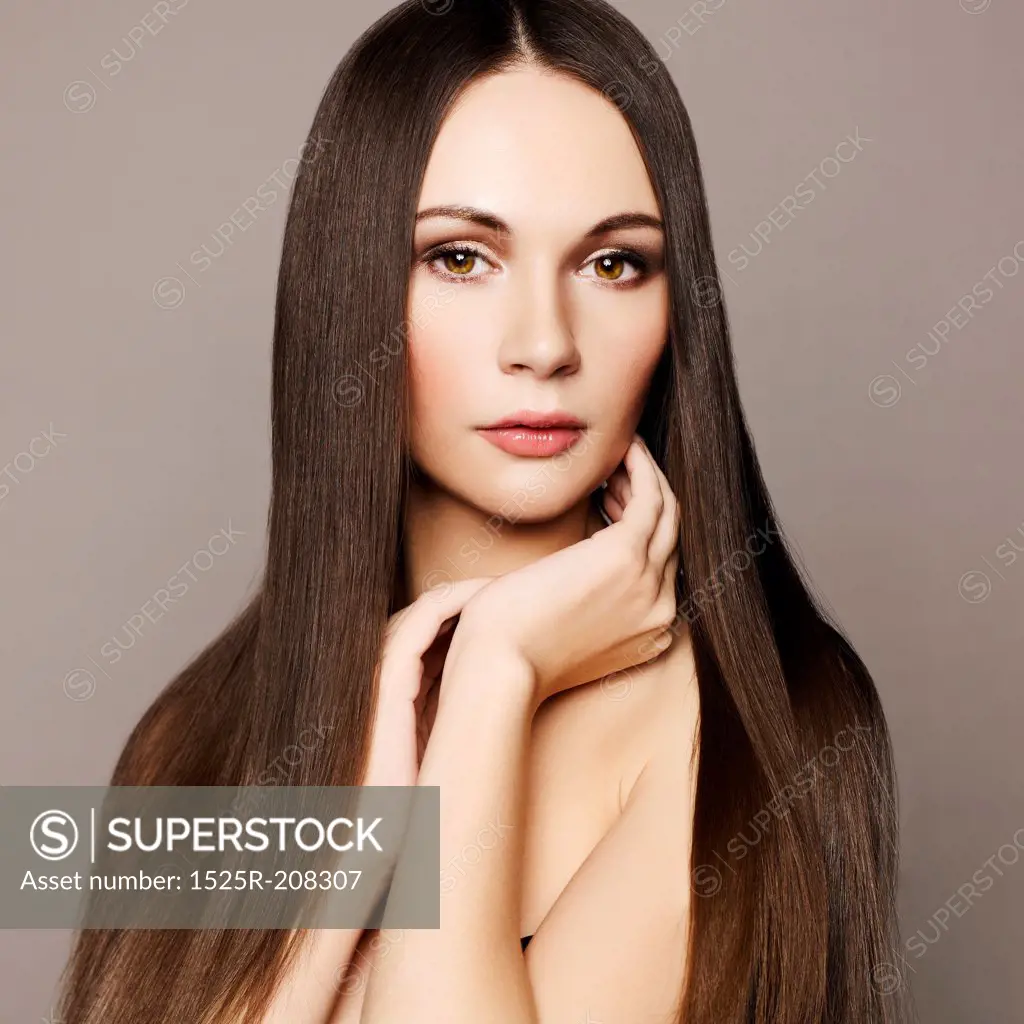 Fashion photo of beautiful woman with magnificent hair