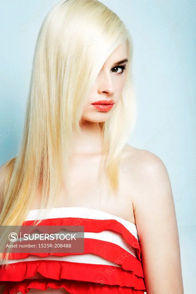 Fashion portrait of a young beautiful blonde woman
